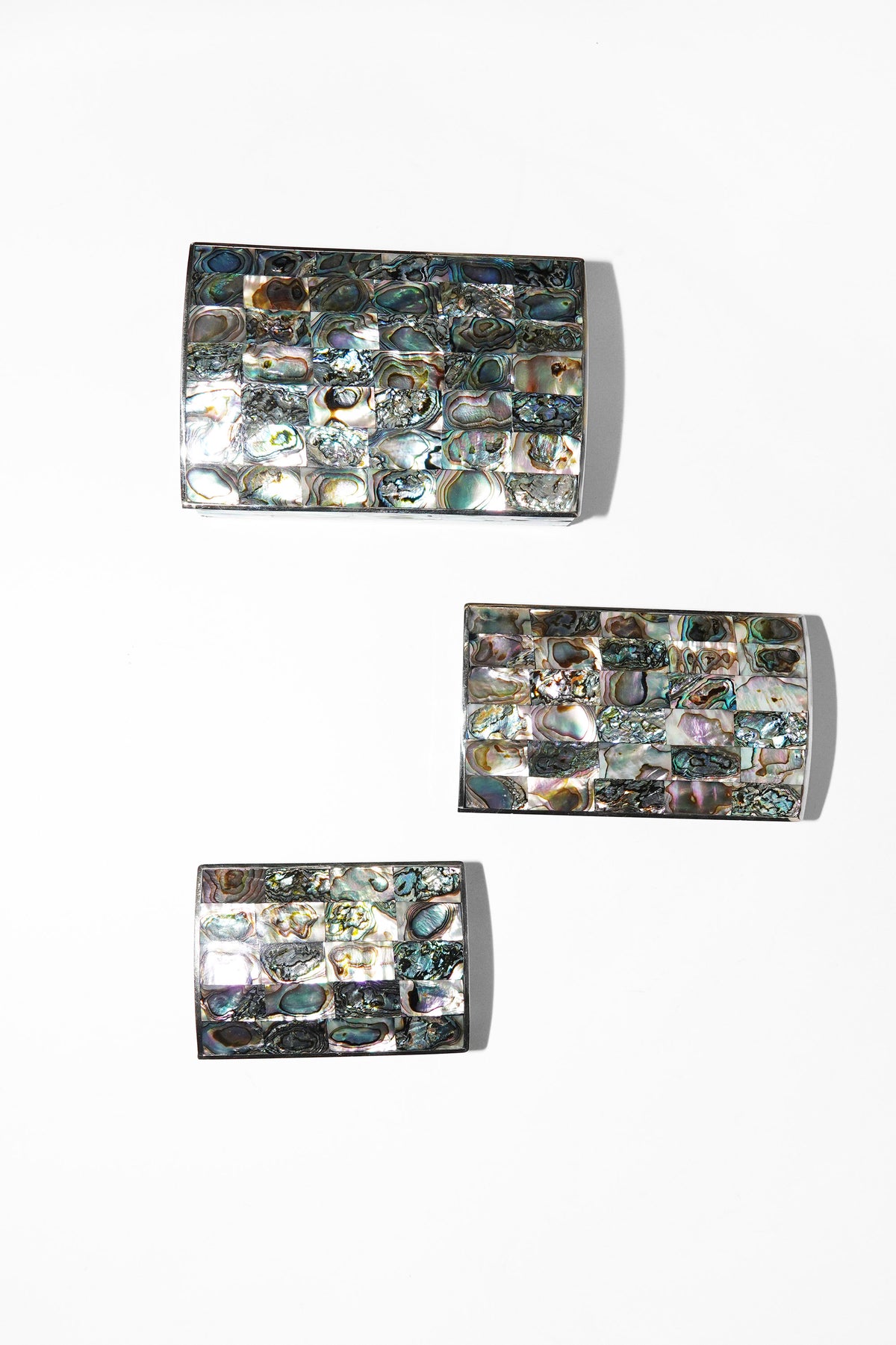 Small abalone inlay jewelry box with wood-lined interior. 2" x 1.25" x 1.75"